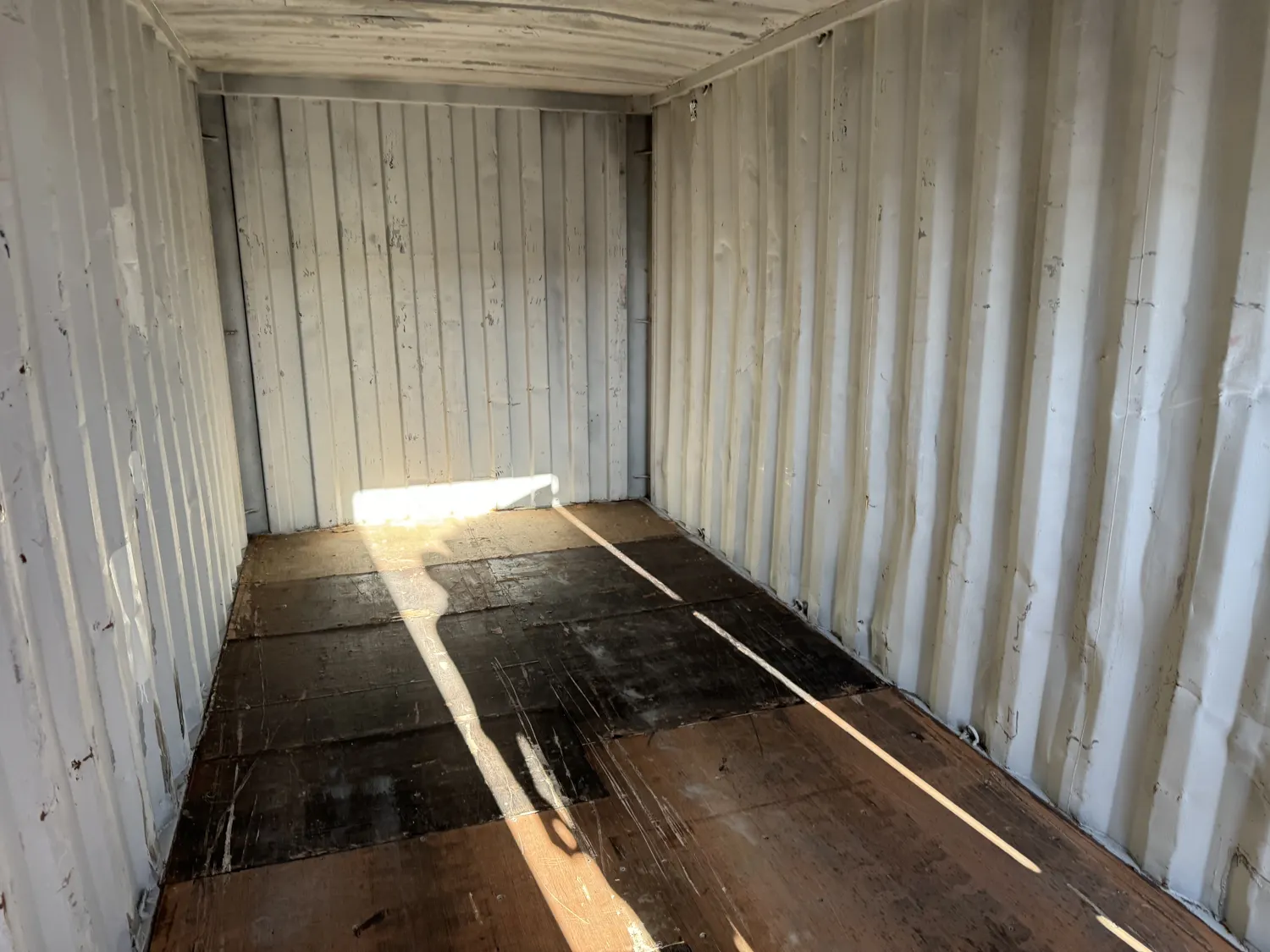Clean container interior with timber floor, checked before hire